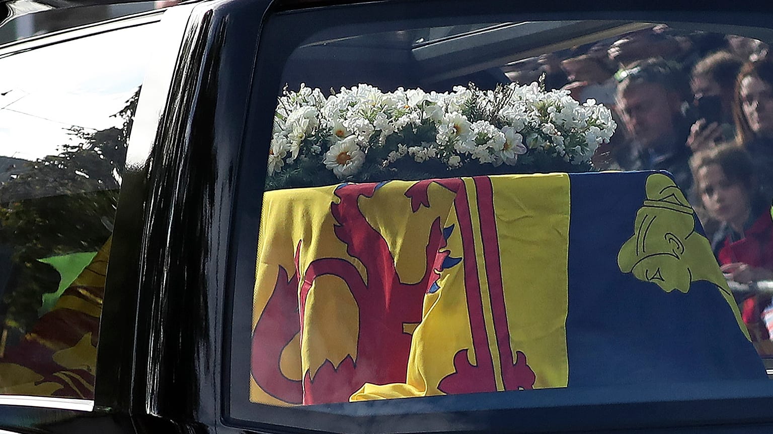 The hearse carrying the coffin of Queen Elizabeth II, draped with the Royal Standard of Scotland, 11 September 2022