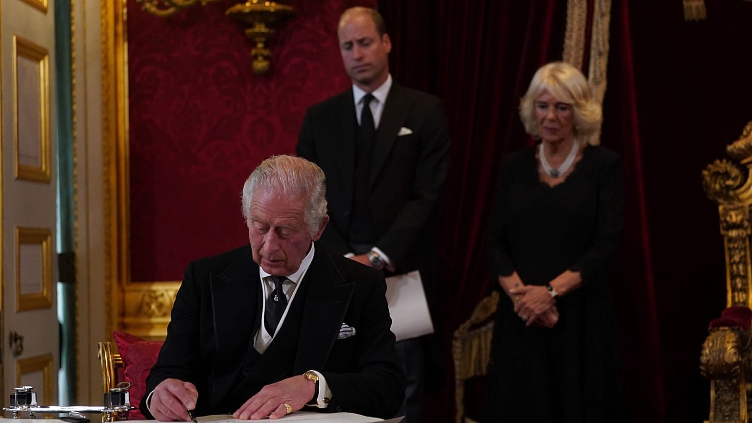 King Charles III signs an oath to uphold the security of the Church in Scotland during the Accession Council at St James's Palace.