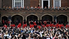 Members of the public listen to the proclamation following the Accession Council ceremony at St James's Palace. 