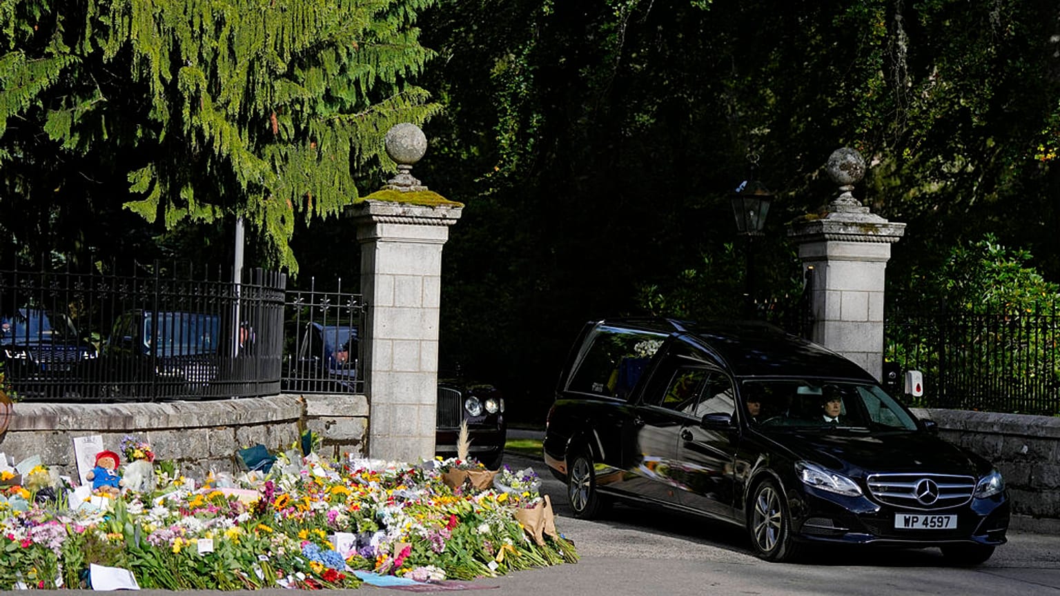 Queen Elizabeth II’s flag-draped coffin leaves Balmoral Castle