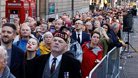Members of the public queue outside St Giles' Cathedral, in Edinburgh, on September 12, 2022