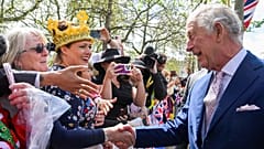 Britain's King Charles III greets well-wishers outside Buckingham Palace, in London, Friday, 5 May, a day before his coronation takes place at Westminster Abbey.