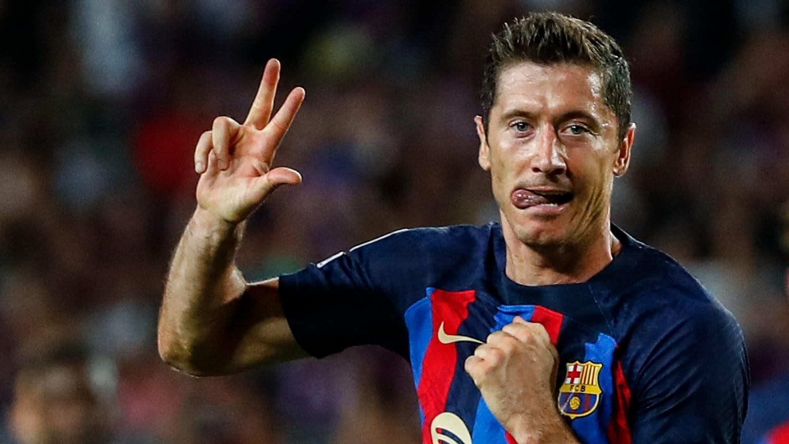 Célébration de Robert Lewandowski après avoir trois marqué trois but