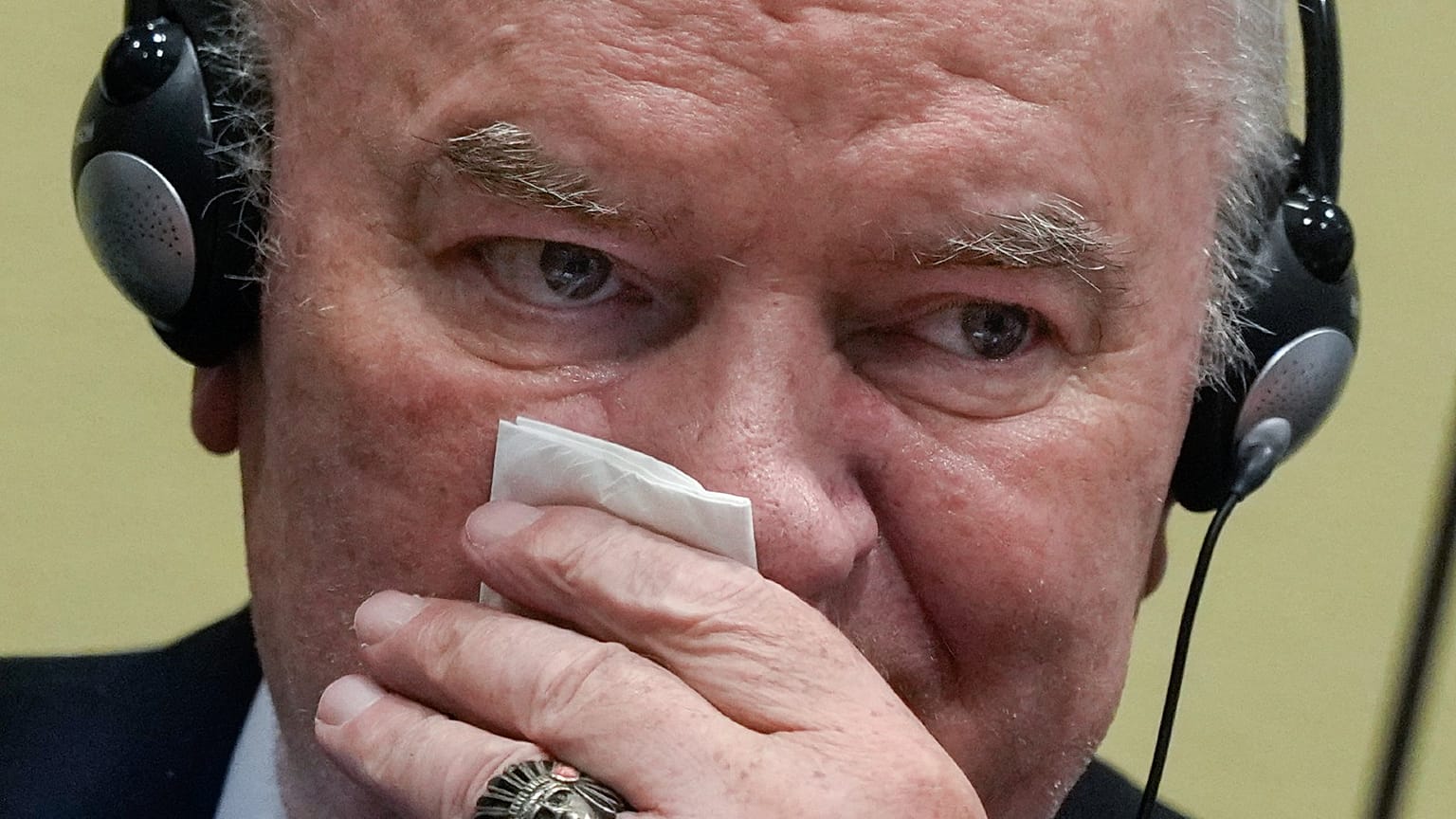 FILE - Former Bosnian Serb military chief Ratko Mladic sits in the court room in The Hague, Netherlands, Tuesday, June 8, 2021