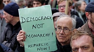 Anti-monarchy protesters gather close to the river Thames in central London, during the 60th anniversary of Queen Elizabeth's accession to the throne, June 3, 2012.