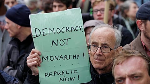 Anti-monarchy protesters gather close to the river Thames in central London,  during the 60th anniversary of Queen Elizabeth's accession to the throne, June 3, 2012.