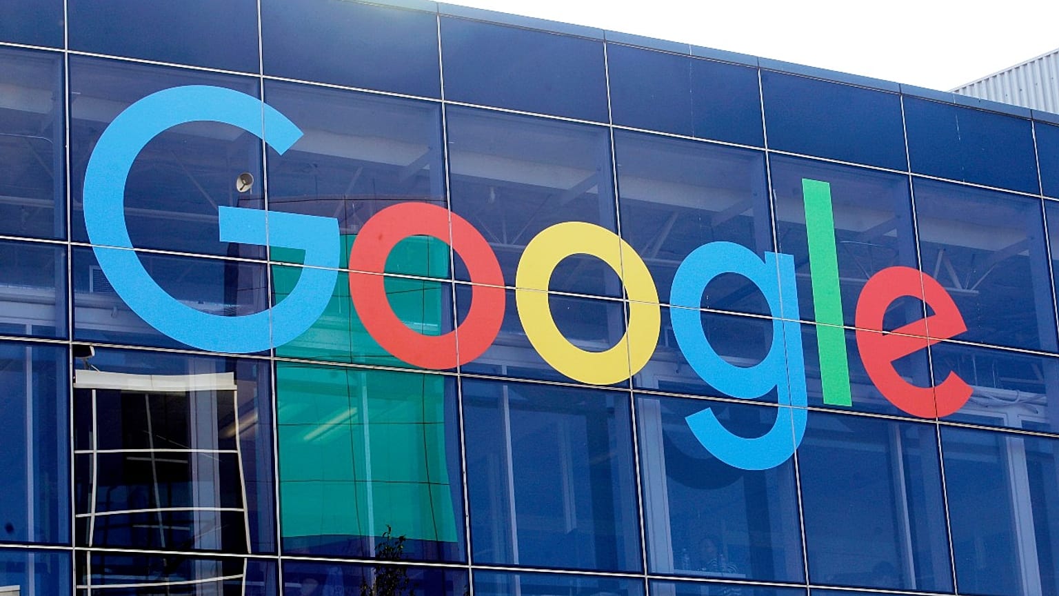 In this Sept. 24, 2019, file photo a sign is shown on a Google building at their campus in Mountain View, Calif.