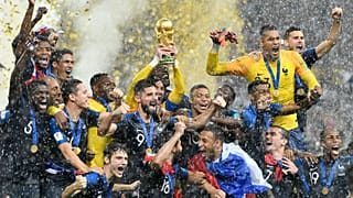 The French squad celebrate after winning the 2018 World Cup