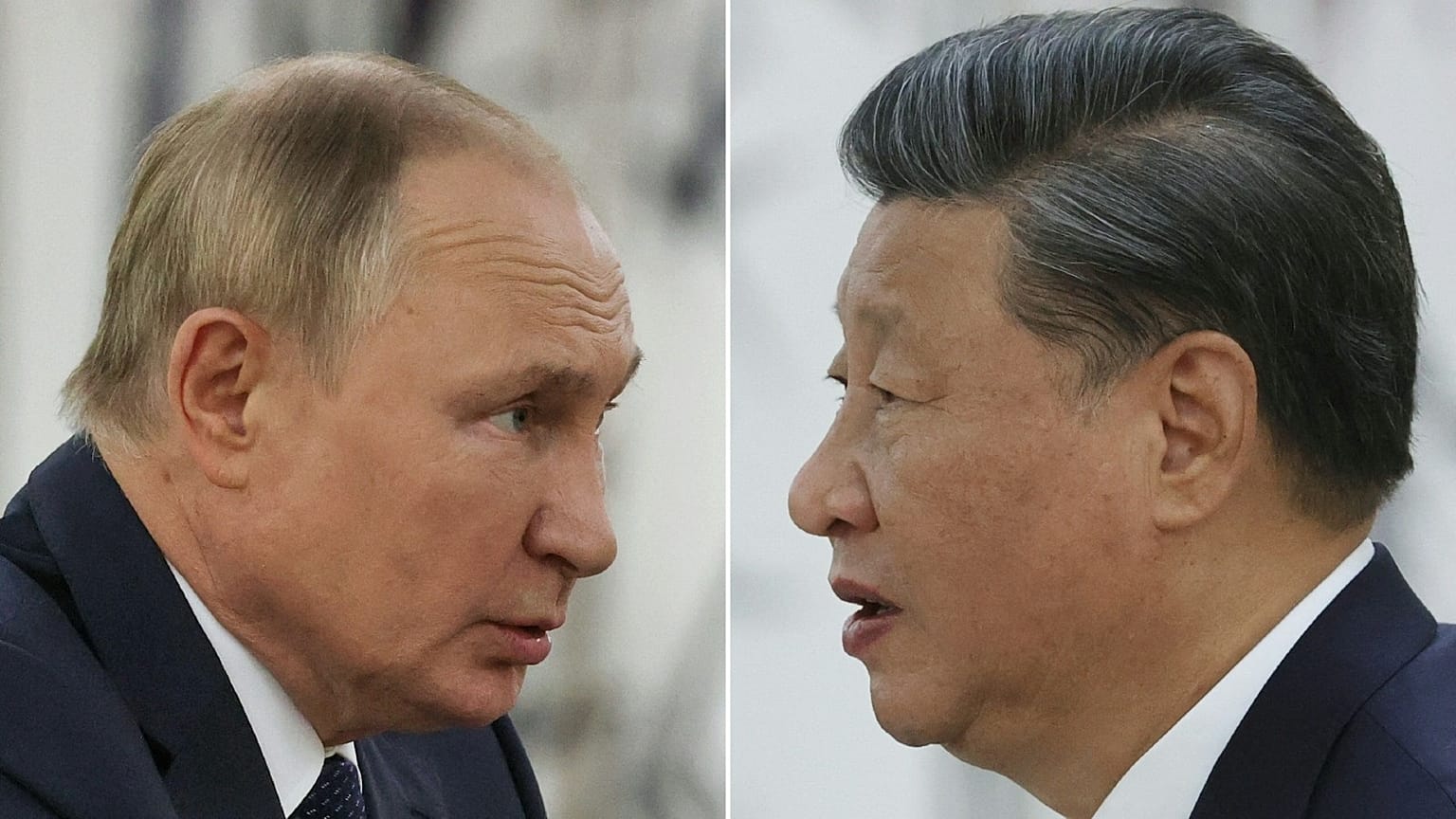 A combination photo shows Russian President Vladimir Putin and China's President Xi Jinping during their meeting in Samarkand