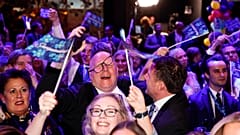 Sweden Democrats supporters celebrate a strong showing on election night, Sunday 11 September 2022, at a hotel near Stockholm