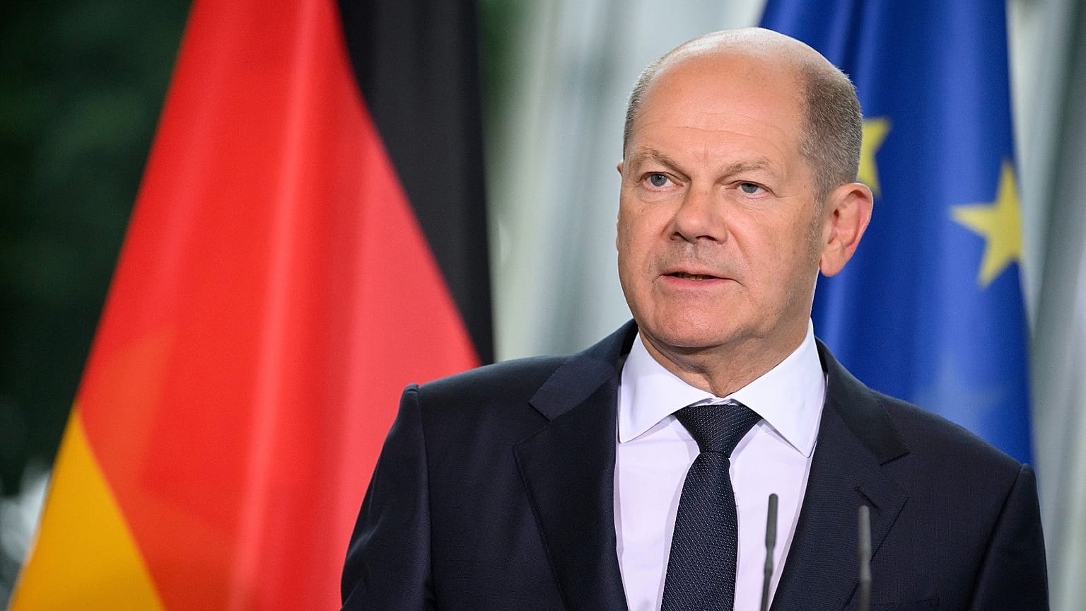 German Chancellor Olaf Scholz speaks during a news conference, 14 September 2022.