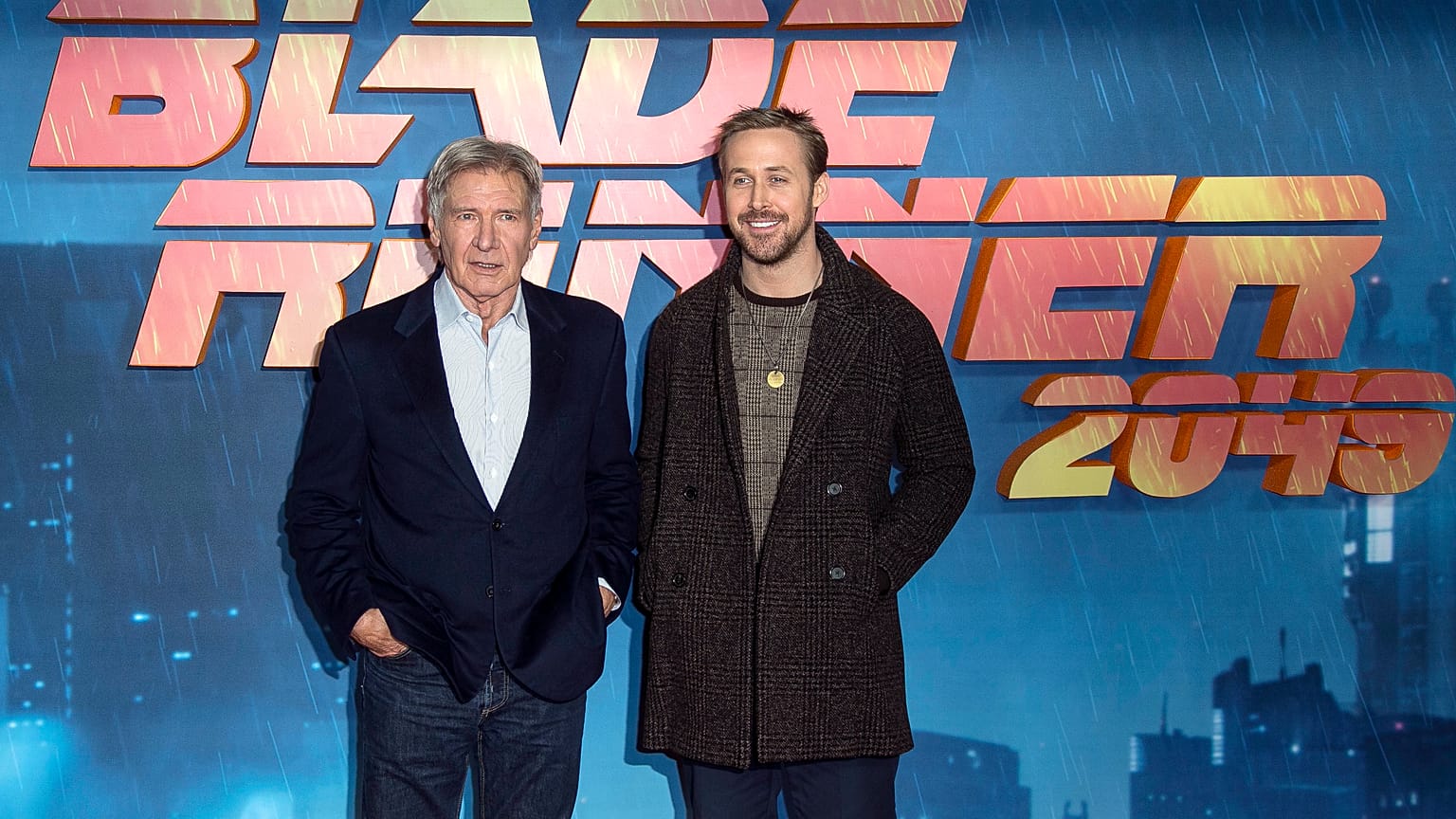 Harrison Ford, left, and Ryan Gosling pose for photographers during the photo call for 'Blade Runner 2049' in London, Thursday, Sept. 21, 2017