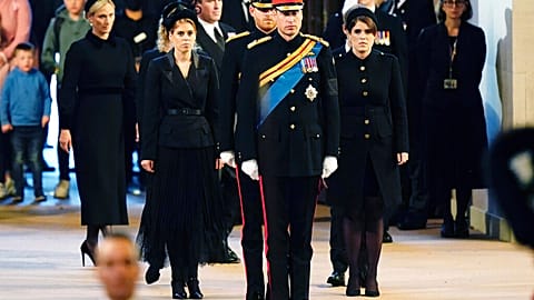 William, now the heir to the throne, stood, his head bowed, at the head of the coffin and Harry at the foot. 