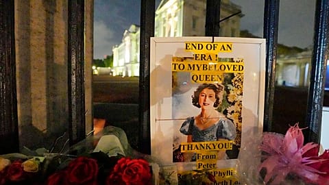 Flowers placed outside Buckingham Palace