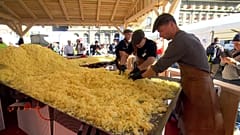 The world's largest rosti - the traditional Swiss potato fritter - was fried up in Bern,