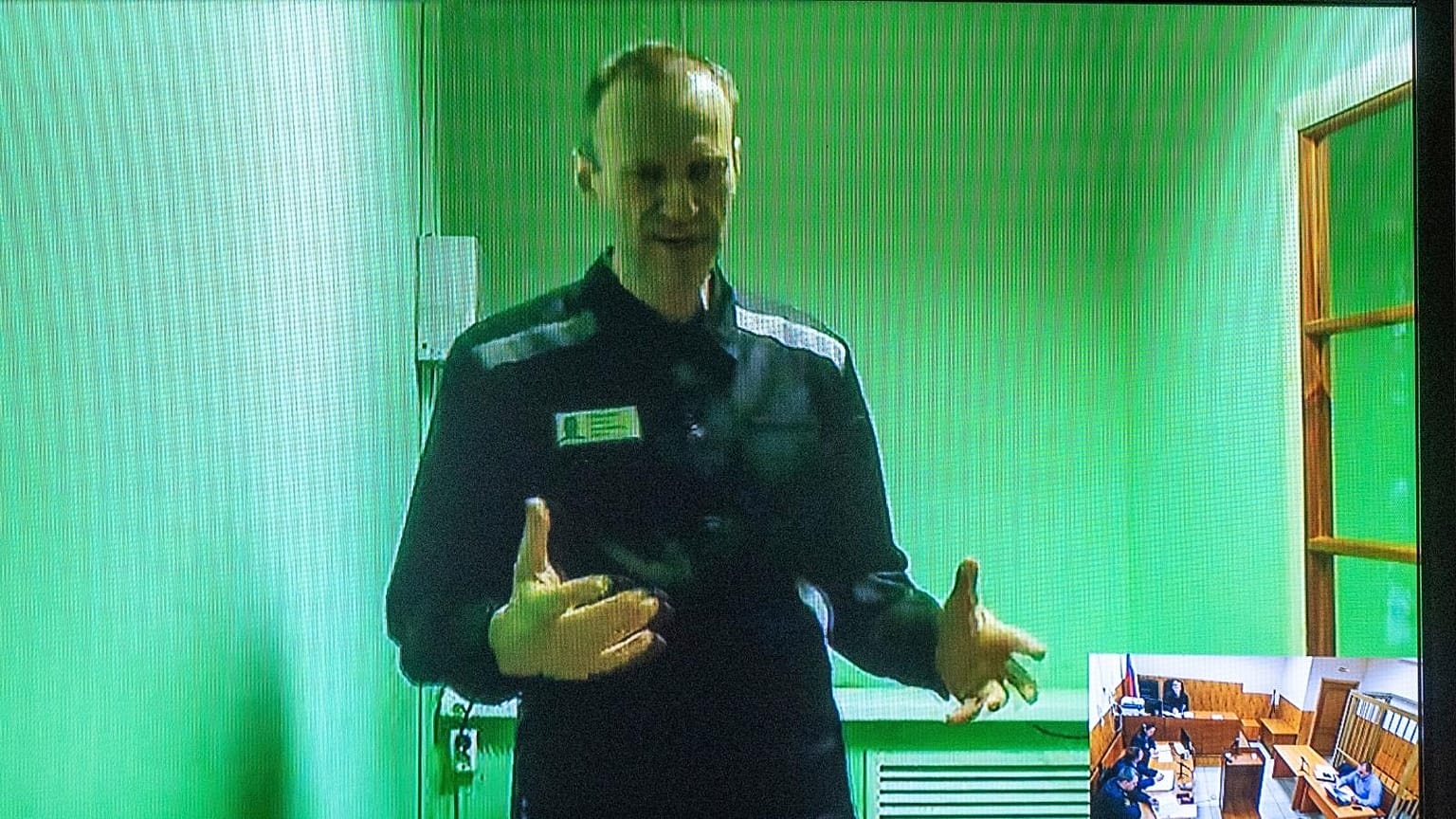 FILE - Russian opposition leader Alexei Navalny is seen on a TV screen, in video provided by Russian Federal Penitentiary Service, 4 September 2022