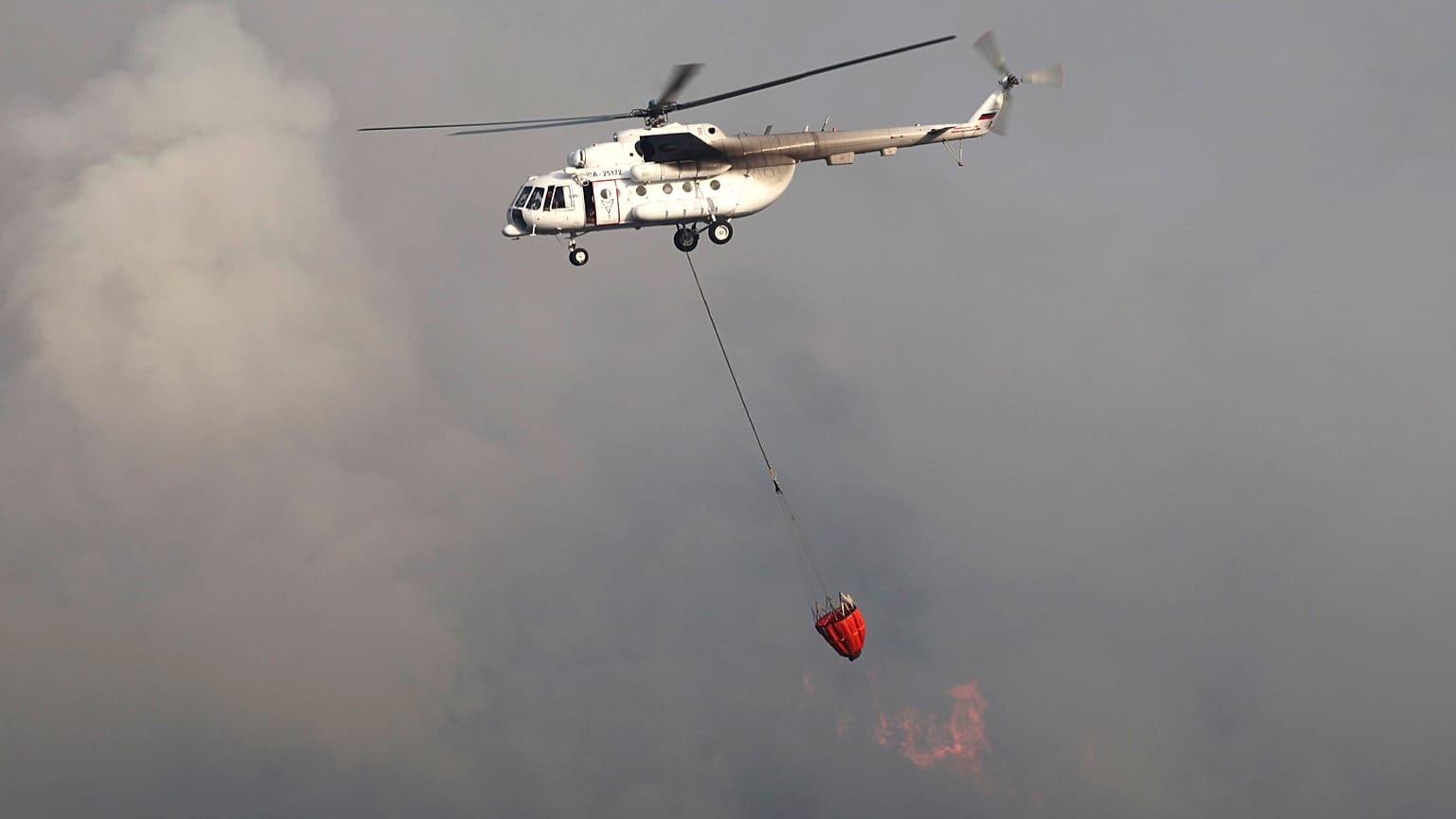 A water-dropping aircraft flies over the Bordubet region, near Marmaris, in June.