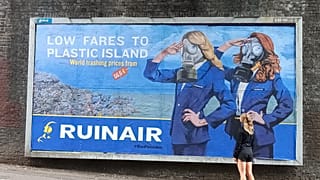 The billboards call out the role of advertising in pushing up emissions.