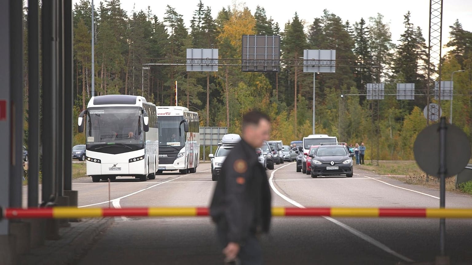 Buses and cars queue to cross the border from Russia to Finland at the Vaalimaa border check point in Virolahti, Finland, Friday Sept. 23, 2022.