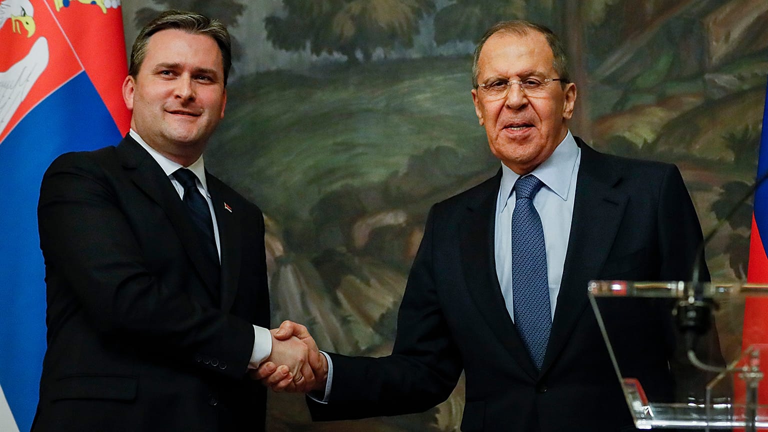 Russian Foreign Minister Sergey Lavrov and Serbian Foreign Minister Nikola Selakovic shake hands after a joint news conference following their talks in Moscow in April 2021