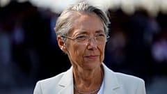 French Prime Minister Elisabeth Borne attends the annual Bastille Day military parade, in Paris, Thursday, July 14, 2022.
