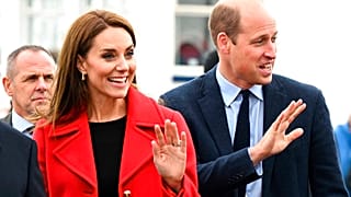 Britain's Kate, Princess of Wales, and Prince William wave during their visit to the RNLI Holyhead Lifeboat Station in Anglesey, north Wales, 