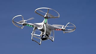 A drone flies at the International Consumer Electronics Show in Las Vegas, Jan. 8, 2014