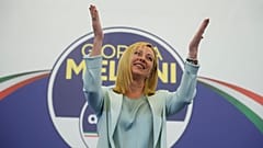 Giorgia Meloni cheered by supporters at her party's electoral headquarters in Rome, Monday 26 Sept 2022.
