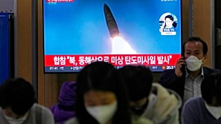 A TV screen shows a file image of North Korea's missile launch during a news program at the Seoul Railway Station in Seoul, South Korea, Thursday, Sept. 29, 2022.