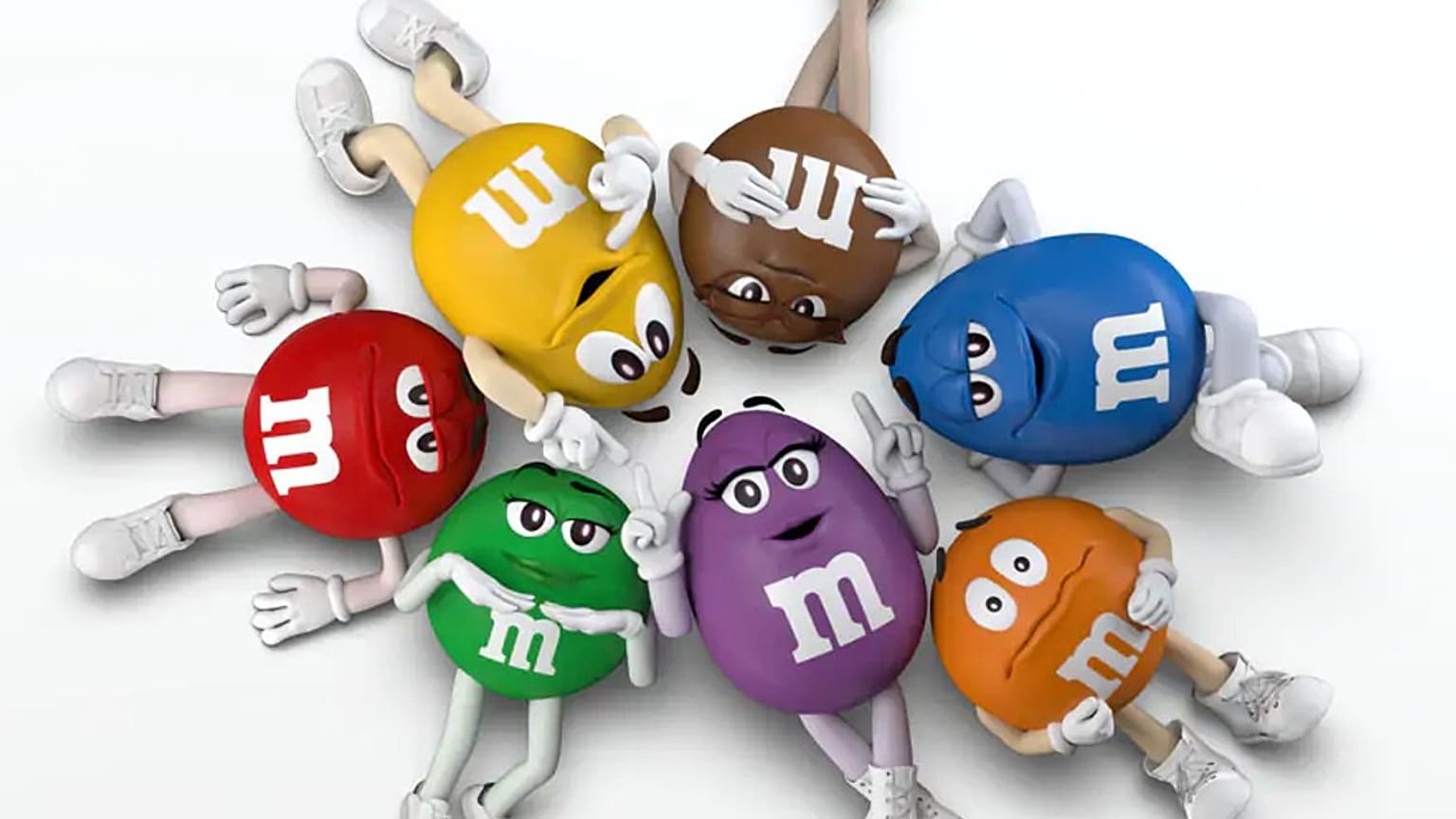 The M&Ms team with their new character, Purple