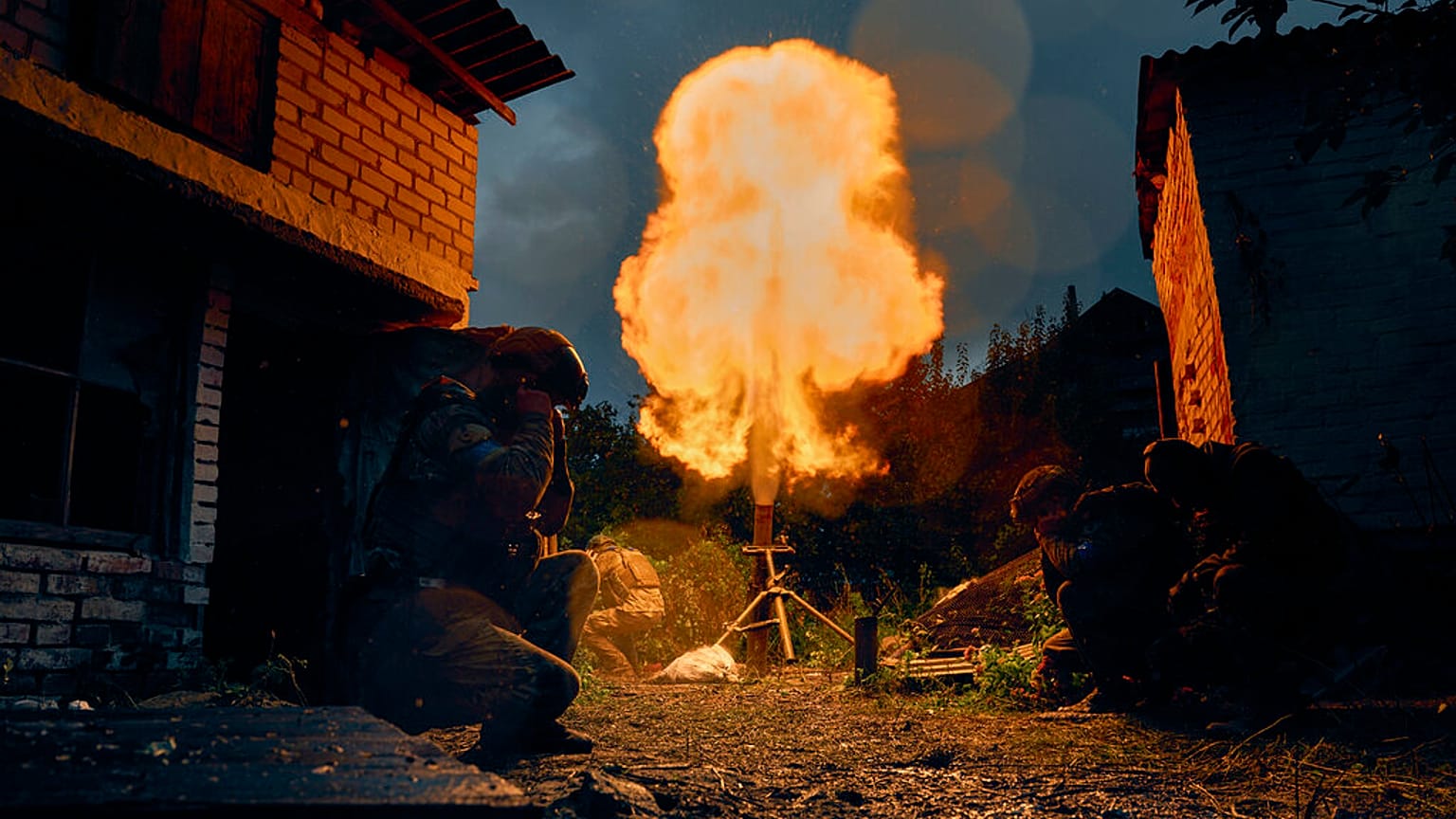 Ukrainian soldiers fire a missile. 