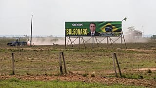 View of a billboard in support of Brazilian President and re-election candidate Jair Bolsonaro at a farm in the municipality of Humaitá.