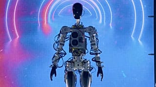 Tesla's prototype robot walking on stage