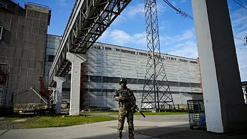 A Russian serviceman guards in an area of the Zaporizhzhia Nuclear Power Station on May 1, 2022