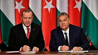 FILE: Turkish President Recep Tayyip Erdogan, left, and Hungarian Prime Minister Viktor Orban sign a document during their meeting in Budapest, Hungary, Thursday, Nov. 7, 2019