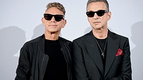 Martin Gore, left, and Dave Gahan of Depeche Mode pose during a photo session in Berlin