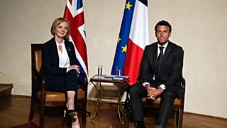 UK Prime Minister Liz Truss and French President Emmanuel Macron meet on the sidelines of the European Political Community meeting in Prague, Czech Republic, Oct 6, 2022.