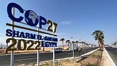 View of a COP27 sign on the road leading to the conference area in Egypt's Red Sea resort of Sharm el-Sheikh town.