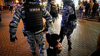 Riot police detain a demonstrator during a protest against Russian mobilisation in Moscow in September.