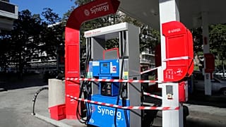 A closed pump is seen at a petrol station, in Lille, northern France, Friday, Oct. 7, 2022.