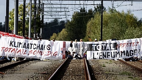 Climate change activists block two TotalEnergies sites in Belgium