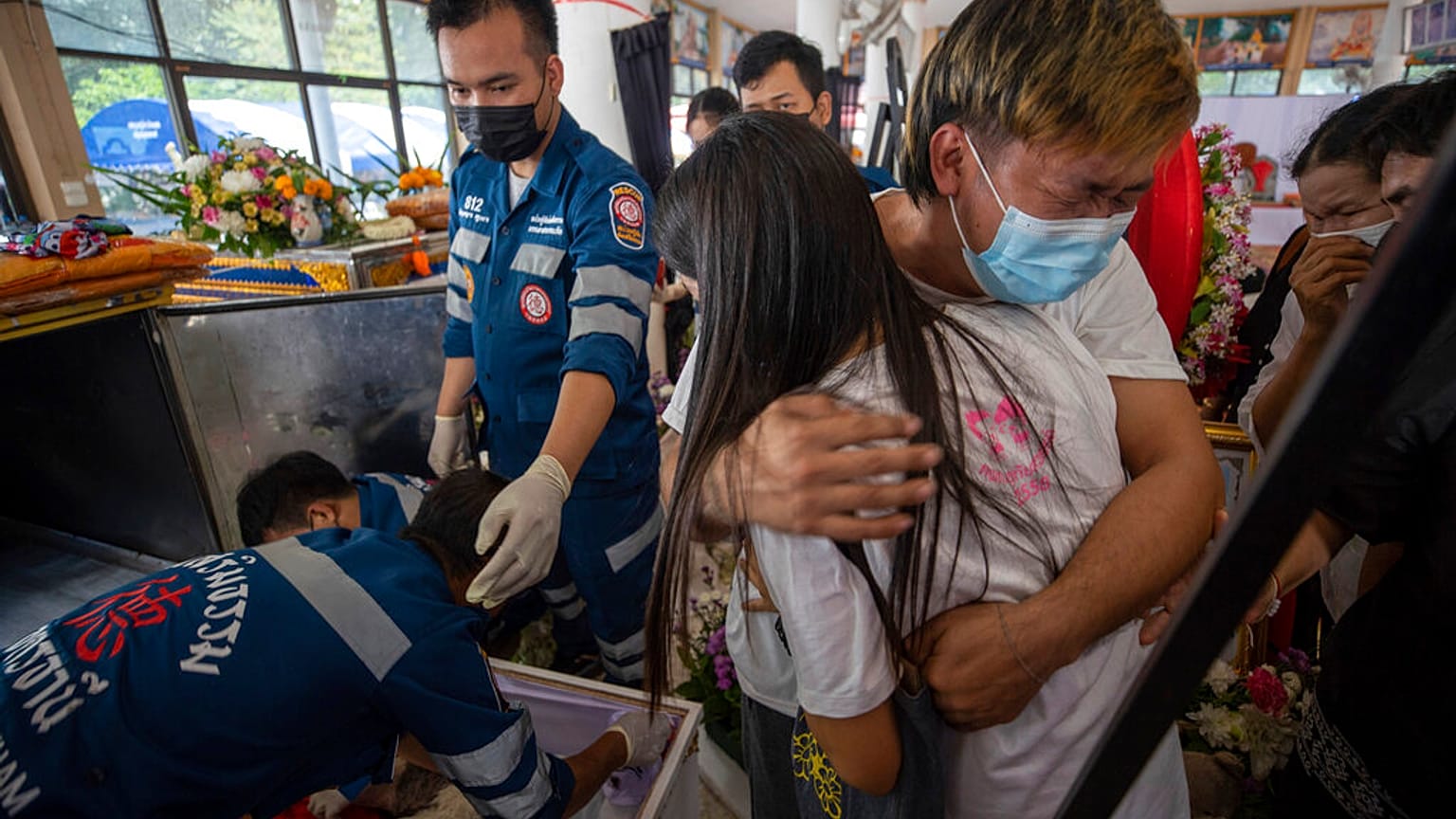 Grieving families gather in temples for three-day ceremony