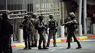دورية لقوات الأمن الإسرائيلية بالقرب من موقع هجوم إطلاق نار بالقرب من مخيم شعفاط للاجئين في القدس، 8 أكتوبر، 2022.