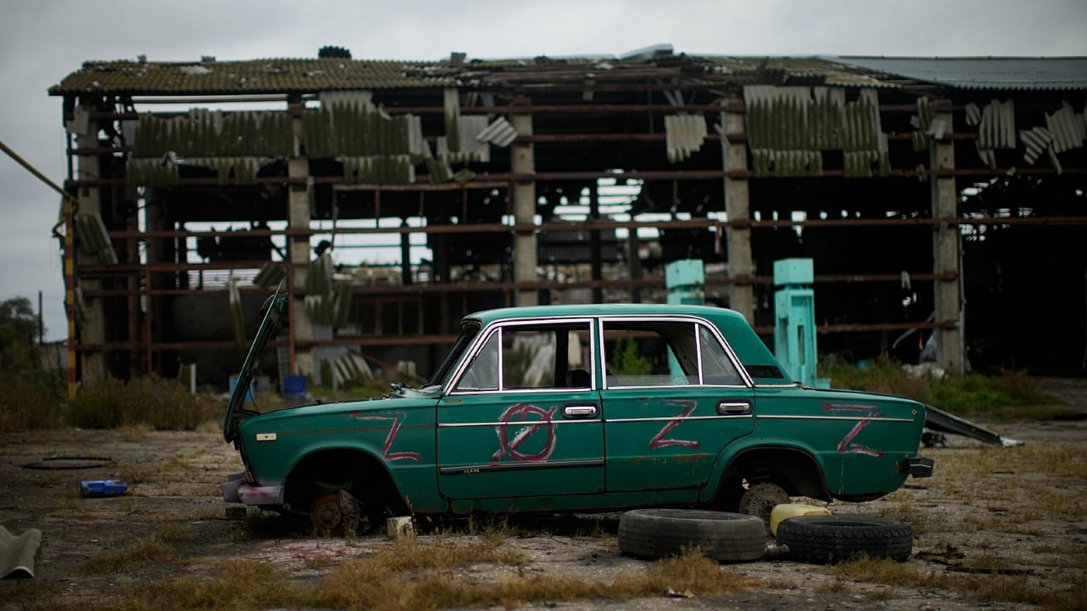 An abandoned car lies on the ground in a heavily damaged grain factory where Russians forces gathered destroyed vehicles at the recaptured town of Lyman, Ukraine
