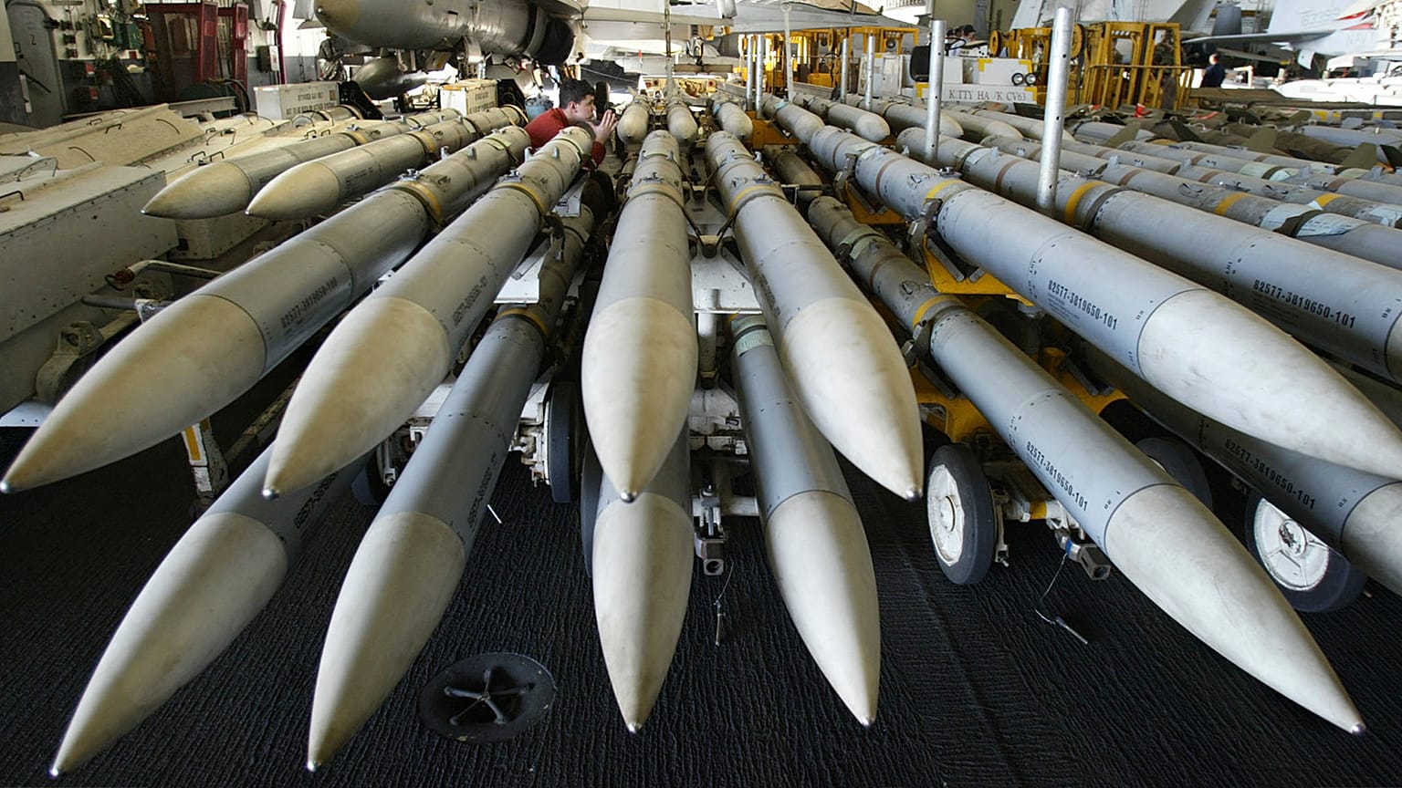 AMRAAM missiles aboard USS Kitty Hawk in 2003.
