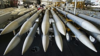 AMRAAM missiles aboard USS Kitty Hawk in 2003.
