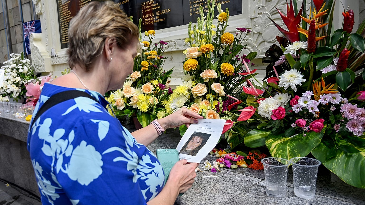 A woman visits a memorial site for the victims to mark the 20th anniversary of the Bali bombings.