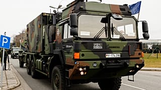 A convoy for the transport of the Patriot air defense missile system leaves the Bundeswehr site of Air Defense Missile Group 26 in Husum, northern Germany, March 16, 2022.