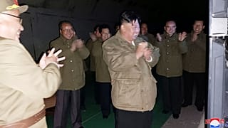 North Korean leader Kim Jong Un supervises tests of long-range cruise missiles at an undisclosed location, 12 October 2022