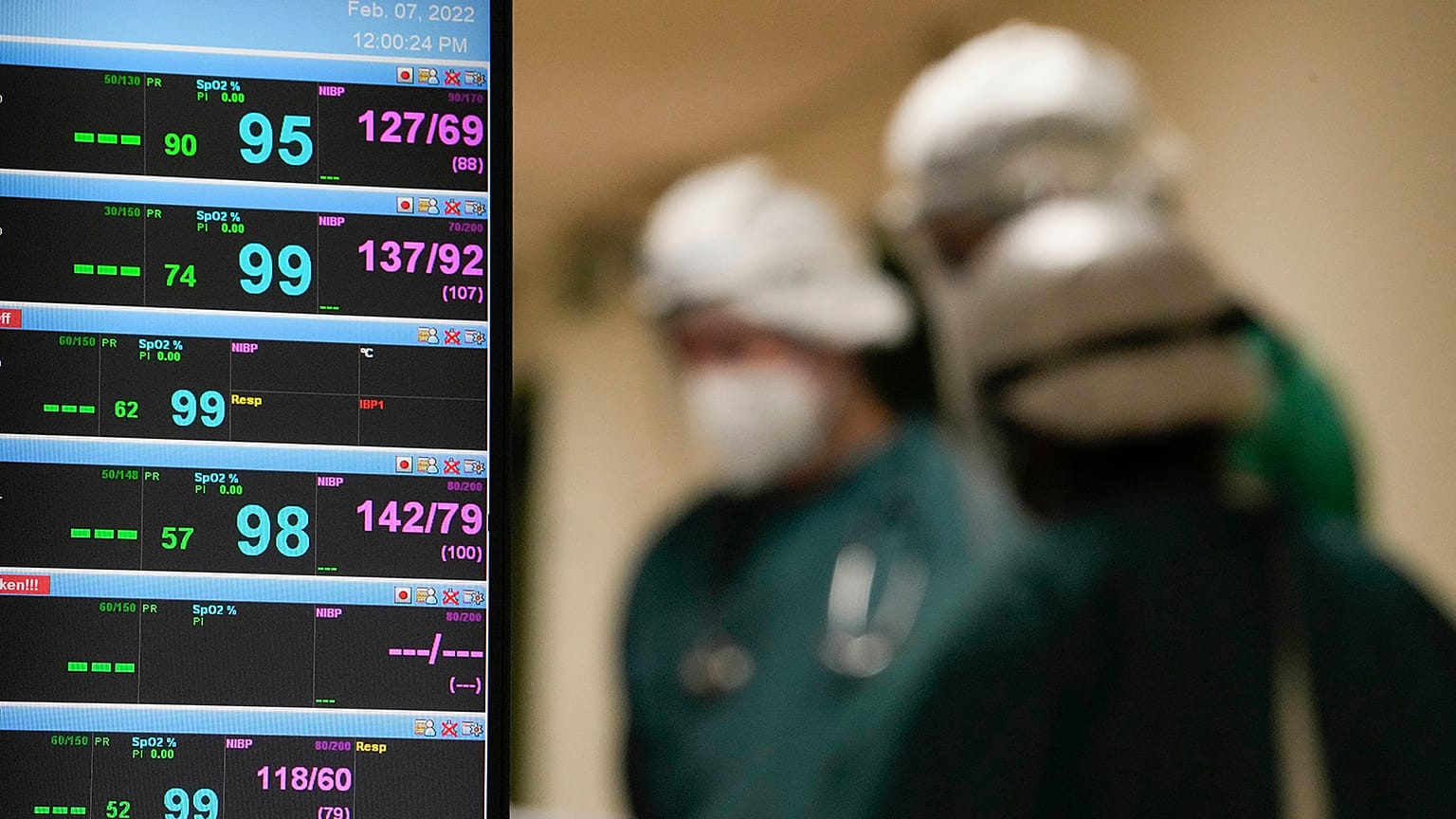 medical personnel working a sub intensive care unit of the Tor Vergata Hospital in Rome, February 2022